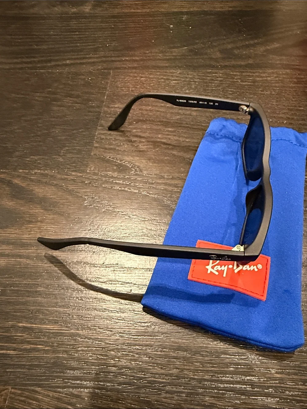 Ray-Ban Matte Black Frame Sunglasses with Blue Mirrored Lenses